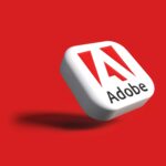 Image of the adobe logo on red background